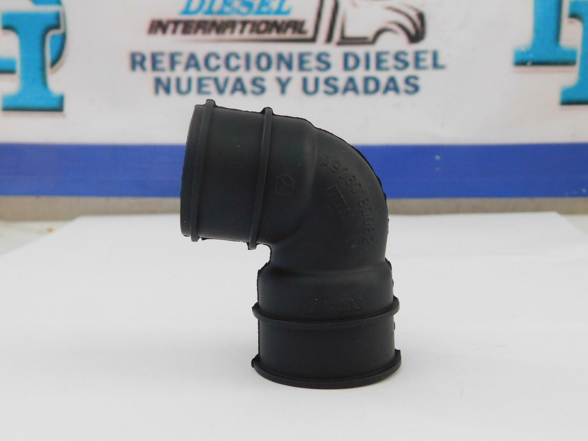 MANGUERA CODO DEFROSTER 906